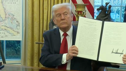 Donald Trump Signing an Executive Order on Auto Tariffs