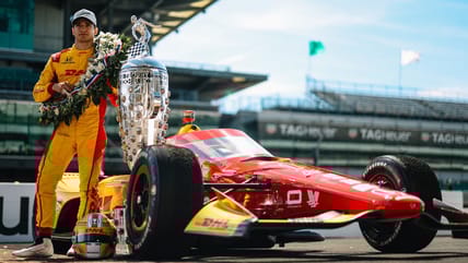 Alex Palou with Borg Warner Trophy