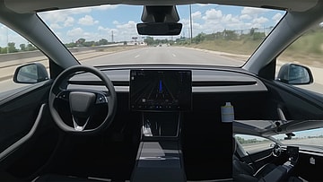 A Tesla Model Y Delivering Itself to a Customer