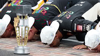 Bubba Wallace Kissing the Bricks at Indy