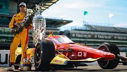 Alex Palou with Borg Warner Trophy