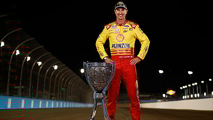 Joey Logano With the 2024 NASCAR Cup Series Championship Trophy