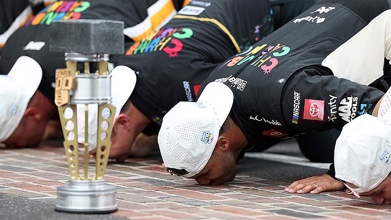 Bubba Wallace Kissing the Bricks at Indy