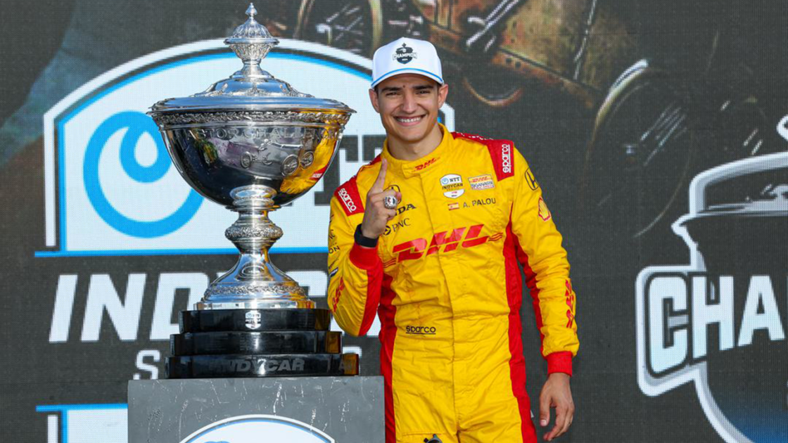 Alex Palou with the IndyCar championship trophy