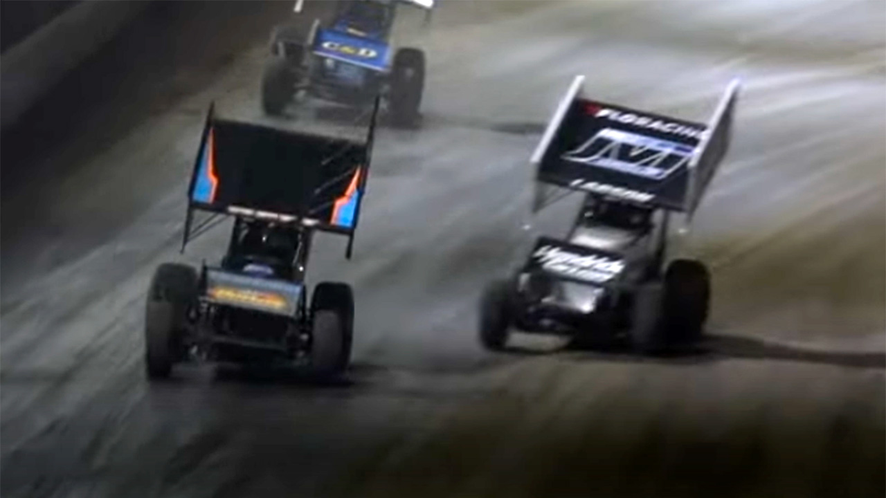 Christopher Bell leading Kyle Larson at Volusia Speedway