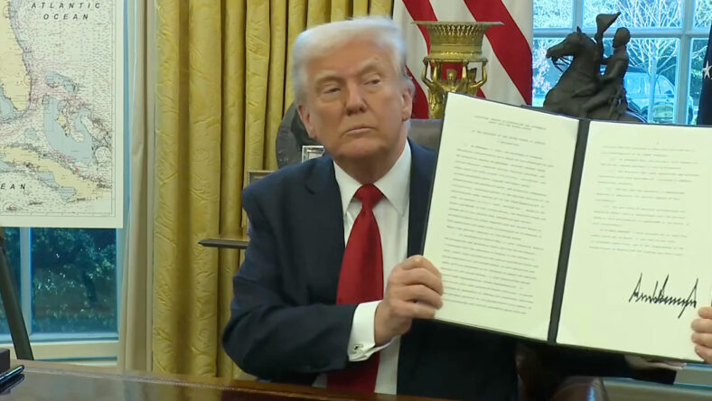 Donald Trump Signing an Executive Order on Auto Tariffs