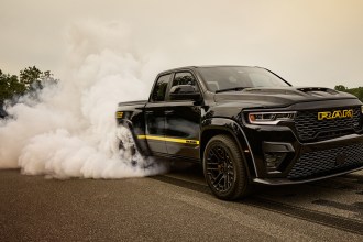 The Ram 1500 Rumble Bee 392 with Direct Connection supercharger kit doing a burnout.